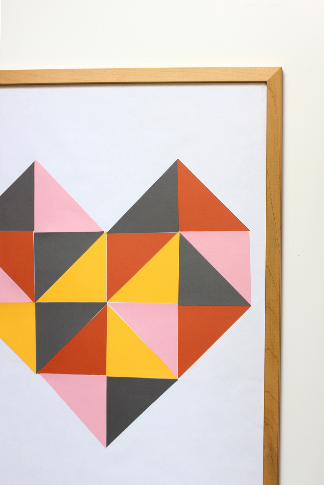 Make this easy heart art suing scrap book paper cut into triangles. 